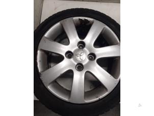 Used Wheel + winter tyre Mitsubishi Colt Price on request offered by Autodemontage van de Laar