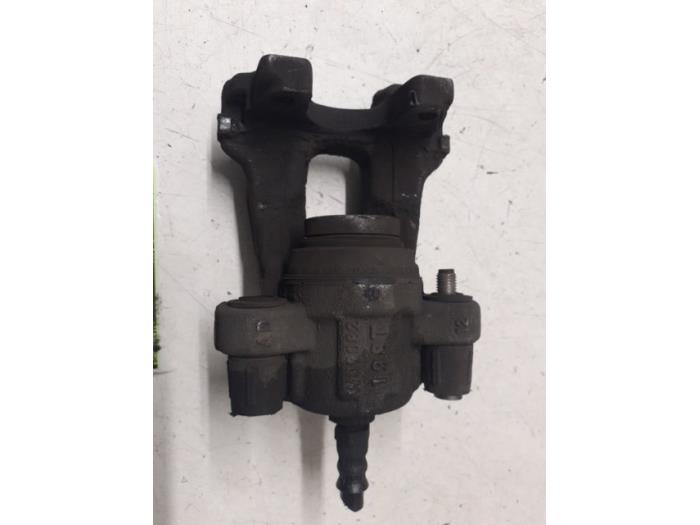 Rear brake calliper, left from a BMW 4 serie Gran Coupe (F36) 420d 2.0 16V 2015
