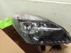 Headlight, right from a Renault Scenic 2011
