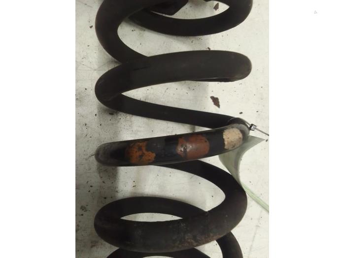 Rear coil spring from a Land Rover Discovery Sport (LC) 2.0 Si4 16V 2015