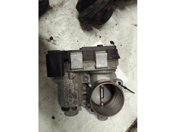 Throttle body from a Volkswagen Up! (121) 1.0 12V 60 2013