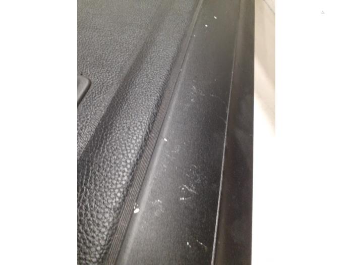 Luggage compartment cover from a Volkswagen Passat Variant (365) 1.6 TDI 16V Bluemotion 2011