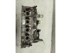 Cylinder head from a Volkswagen Polo V (6R) 1.2 TSI 2010
