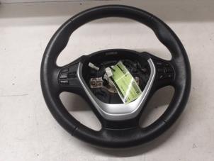 Used Steering wheel BMW 1 serie (F20) 118i 1.6 16V Price on request offered by Autodemontage van de Laar