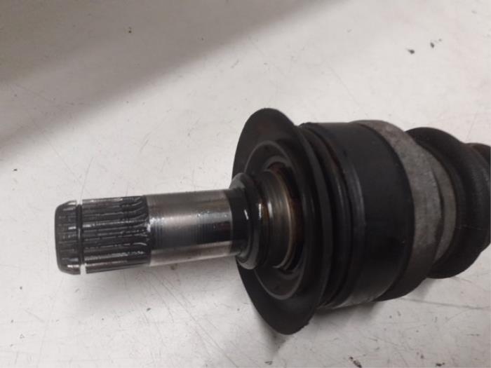 Drive shaft, rear left from a BMW 1 serie (F20) 118i 1.6 16V 2011