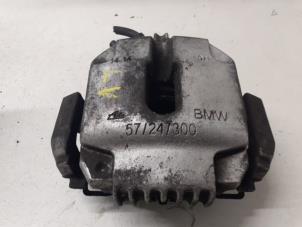 Used Front brake calliper, left BMW 3 serie Touring (E91) 325i 24V Price on request offered by Autodemontage van de Laar