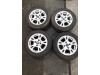 Set of wheels + tyres from a Ford Fiesta 6 (JA8), 2008 / 2017 1.6 TDCi 16V, Hatchback, Diesel, 1.560cc, 66kW (90pk), FWD, HHJC, 2008-06 / 2012-12 2011