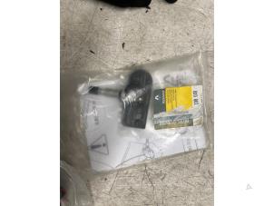 Däcktryckssensor från en Renault Laguna III (BT) 1.5 dCi 110 FAP 2012