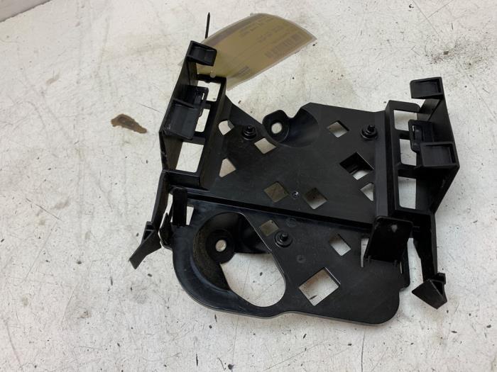 Engine control module holder