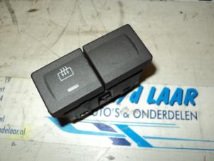 Usados Interruptor de calefactor luneta Ford Fiesta 5 (JD/JH) 1.3 Precio € 15,00 Norma de margen ofrecido por Autodemontage van de Laar