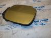 Tank cap cover from a Renault Clio III (BR/CR), 2005 / 2014 1.5 dCi 85, Hatchback, Diesel, 1.461cc, 63kW (86pk), FWD, K9K766; K9KT7, 2005-06 / 2012-12, BR1F; CR1F; BRCF; CRCF 2007