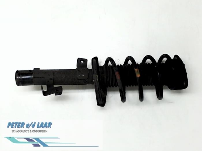 Front shock absorber rod, left from a Ford Focus 2 Wagon 1.6 16V 2009