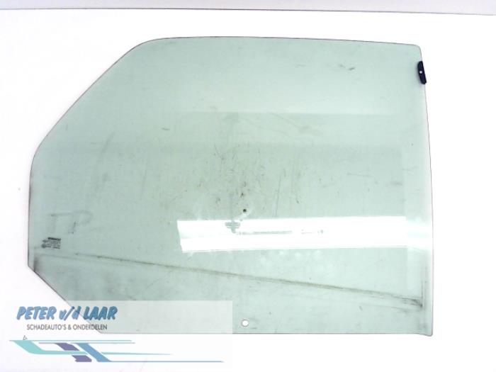 Vitre portière 4portes arrière droite d'un Renault Megane Scénic (JA) 1.6 16V RT,RXE,RXT 2003