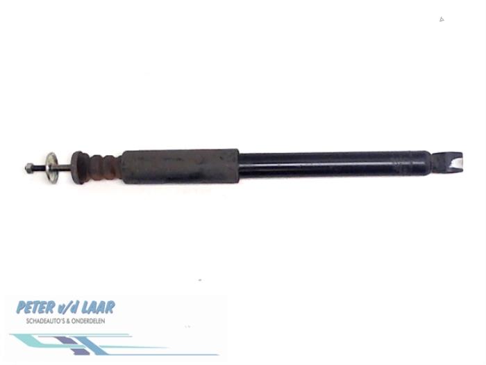 Rear shock absorber, left from a Opel Agila (B) 1.2 16V 2009