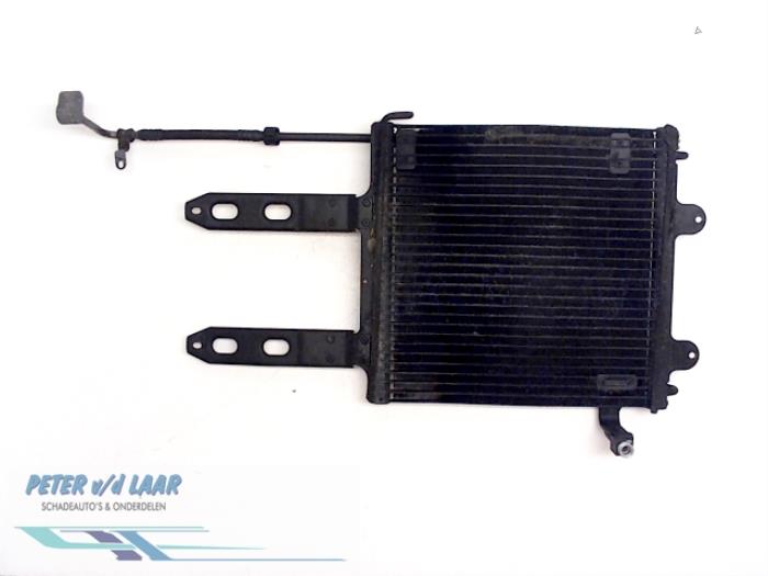 Air conditioning radiator from a Volkswagen Polo III (6N2) 1.0 2001
