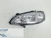 Headlight, left from a Opel Astra 1999