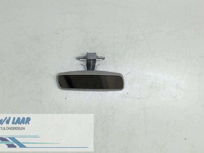 Rear view mirror from a Renault Laguna III Estate (KT) 1.5 dCi 110 2010