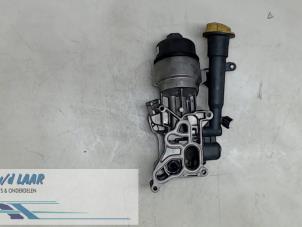 Used Oil filter housing Opel Corsa Price on request offered by Autodemontage van de Laar