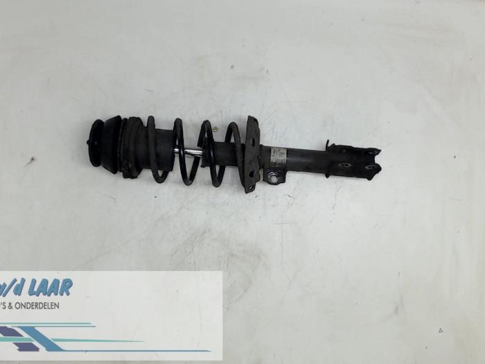 Front shock absorber rod, right from a Opel Corsa C (F08/68) 1.2 16V 2001