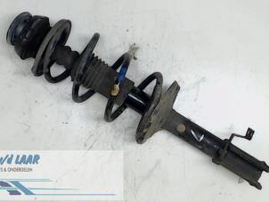 Used Front shock absorber rod, left Dacia Logan MCV (KS) 1.6 16V Price € 70,00 Margin scheme offered by Autodemontage van de Laar