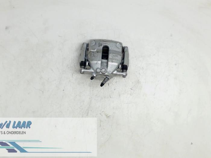 Front brake calliper, left from a Renault Kangoo Express (FW) 1.6 16V 2015