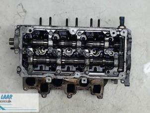 Used Cylinder head Volkswagen Polo V (6R) 1.2 TDI 12V BlueMotion Price € 250,00 Margin scheme offered by Autodemontage van de Laar