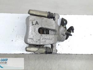 Used Rear brake calliper, left Renault Scénic II (JM) 1.6 16V Price € 50,00 Margin scheme offered by Autodemontage van de Laar