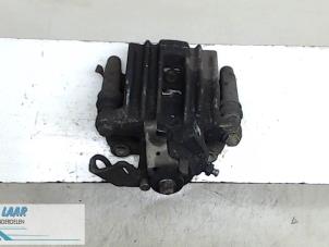 Used Rear brake calliper, left Volkswagen Polo V (6R) 1.6 TDI 16V 105 Price € 50,00 Margin scheme offered by Autodemontage van de Laar