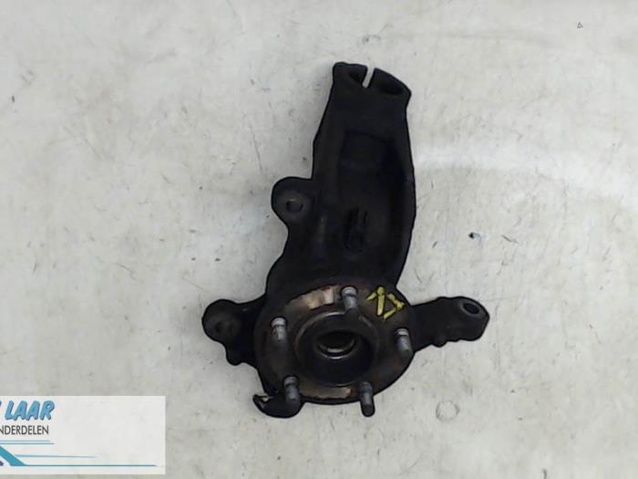 Knuckle, front left from a Ford Mondeo IV Wagon 2.0 TDCi 140 16V 2008
