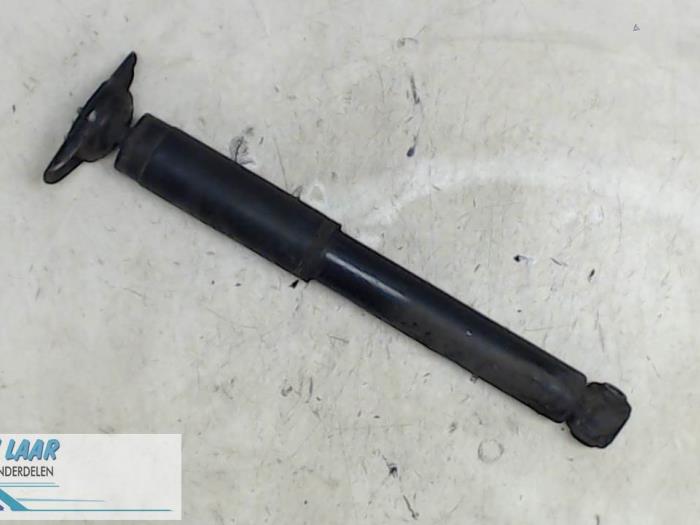 Rear shock absorber, left from a Ford Mondeo IV Wagon 2.0 TDCi 140 16V 2008