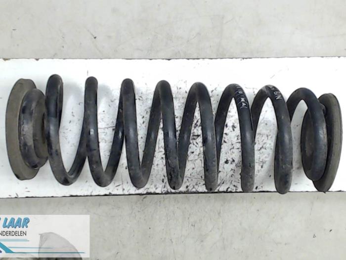 Rear coil spring from a Volkswagen Scirocco (137/13AD)  2011