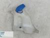 Front windscreen washer reservoir from a Volkswagen Lupo (6X1), 1998 / 2005 1.0 MPi 50, Hatchback, 2-dr, Petrol, 999cc, 37kW (50pk), FWD, AUC, 2000-05 / 2005-04, 6X1 2000