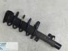 Front shock absorber rod, left from a Ford Focus 2, 2004 / 2012 1.6 Ti-VCT 16V, Hatchback, Petrol, 1,596cc, 85kW (116pk), FWD, HXDA; HXDB; SIDA; EURO4, 2004-07 / 2012-09 2009