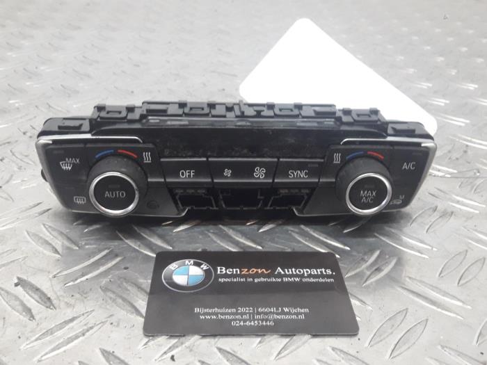 Panel de control de calefacción de un BMW 2-Serie 2015