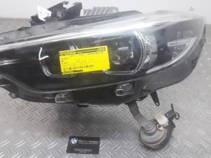 Używane Reflektor lewy BMW 4-Serie Cena na żądanie oferowane przez Benzon Autodemontage