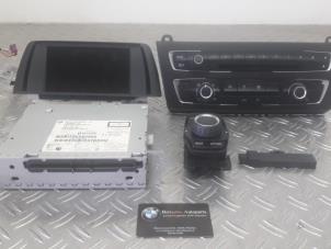 Used Navigation set BMW 1-Serie Price on request offered by Benzon Autodemontage