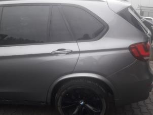 Used Rear side panel, left BMW X5 Price on request offered by Benzon Autodemontage