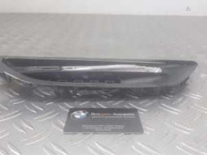 Used Grille strip BMW 5 serie (F10) M5 V8 32V TwinPower Turbo Price on request offered by Benzon Autodemontage