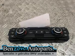 Usados Panel de control de aire acondicionado BMW 1 serie (E81) 118d 16V Precio € 50,00 Norma de margen ofrecido por Benzon Autodemontage