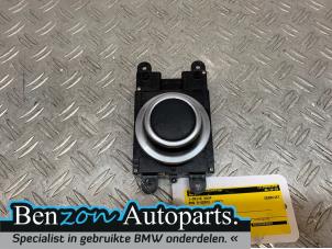 Used I-Drive knob BMW 5-Serie Price on request offered by Benzon Autodemontage