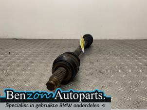 Used Drive shaft, rear left BMW 5 serie Touring (F11) 520d 16V Price on request offered by Benzon Autodemontage