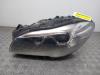 Headlight, left from a BMW 5 serie (F10) 518d 16V 2014
