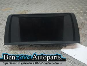 Used Display Multi Media control unit BMW 1 serie (F20) 116i 1.5 12V Price on request offered by Benzon Autodemontage