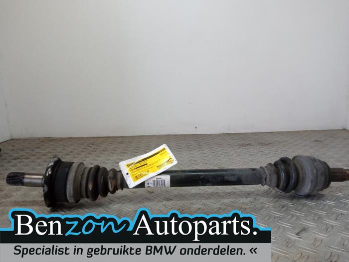 Drive shaft, rear left from a BMW 5 serie (F10) 530i 24V 2011
