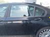 Porte arrière gauche d'un BMW 7 serie (F01/02/03/04) 750i,Li,LiS V8 32V 2011