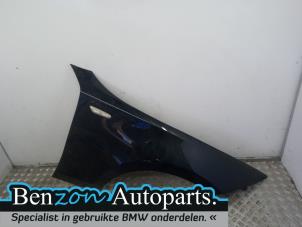 Used Front wing, right BMW 1 serie (E87/87N) 118d 16V Price on request offered by Benzon Autodemontage
