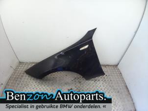Used Front wing, left BMW 1 serie (E87/87N) 118d 16V Price on request offered by Benzon Autodemontage