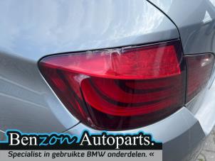 Used Taillight, left BMW 5 serie (F10) 520d 16V Price on request offered by Benzon Autodemontage
