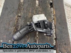 Used Oil filter housing BMW 1-Serie Price on request offered by Benzon Autodemontage