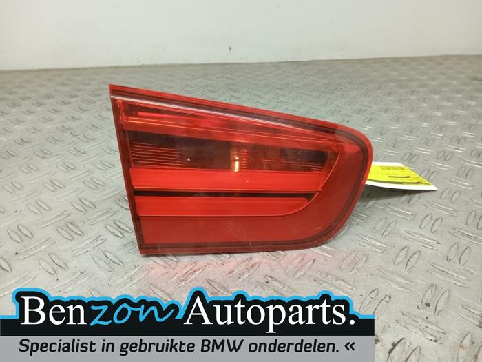 Taillight, left from a BMW 1 serie (F20) 118i 1.5 TwinPower 12V 2017